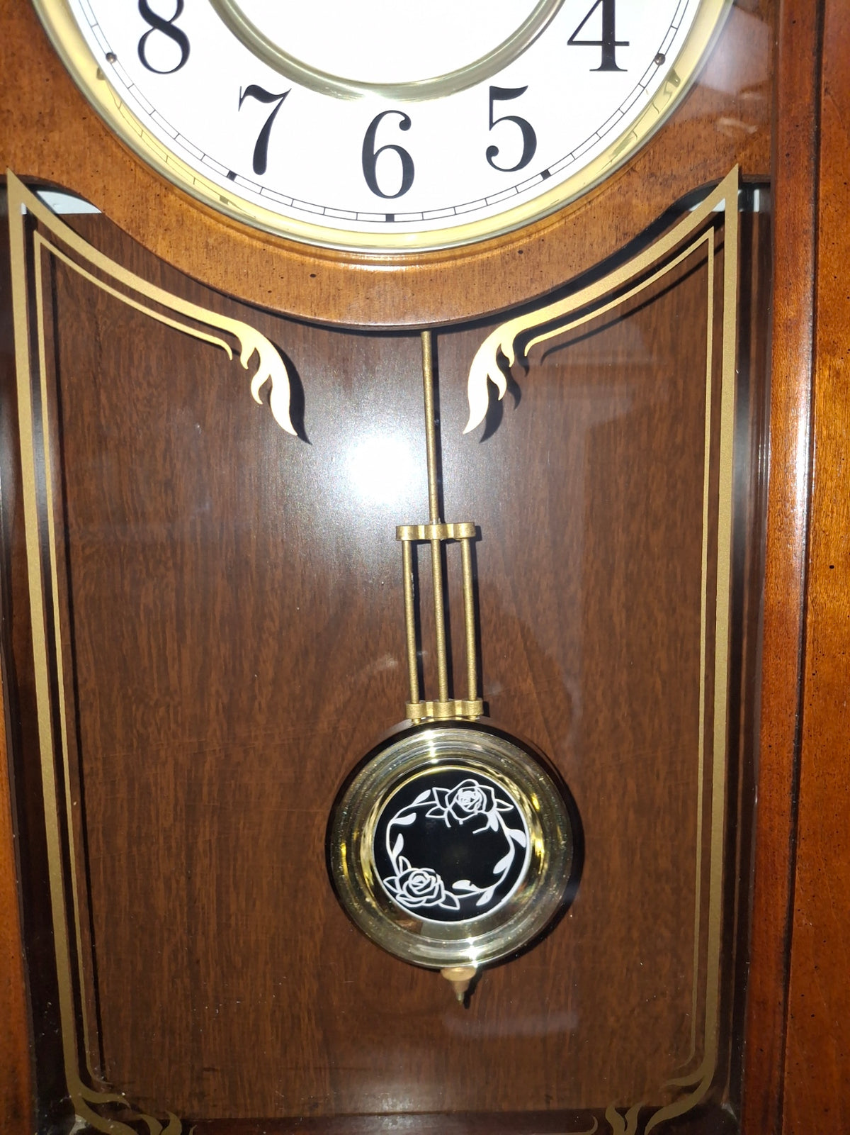 Howard MIller Wall Clock with chimes and pendulum