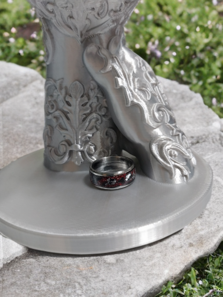 Handmade Ring. Clear stones with Red Glitter. Band is Stainless Steel. Size 7